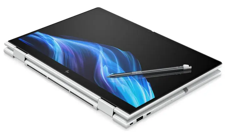 Touchscreen convertible laptop folded flat with a stylus