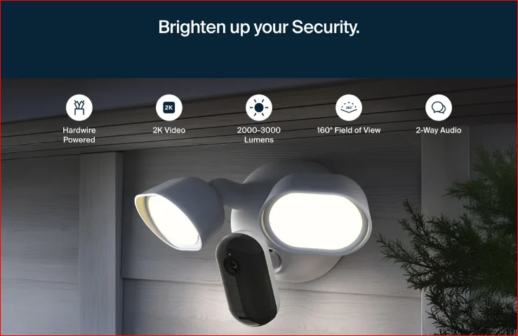 Arlo Wired Floodlight security camera illuminating the exterior of a home